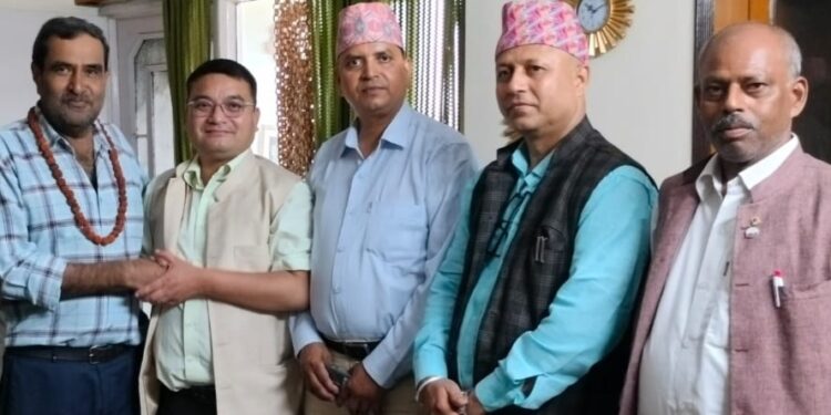 SAARC Journalist Forum President Raju Lama presented Rudraksh to IFWJ General Secretary Vipin Dhuliya