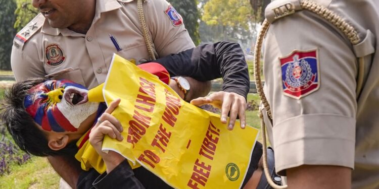 Members of the Tibetan community protest near the Chinese Embassy in Delhi